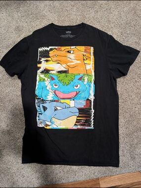 Black Graphic Tee with Orange, Teal & Blue Pokemon Trio
